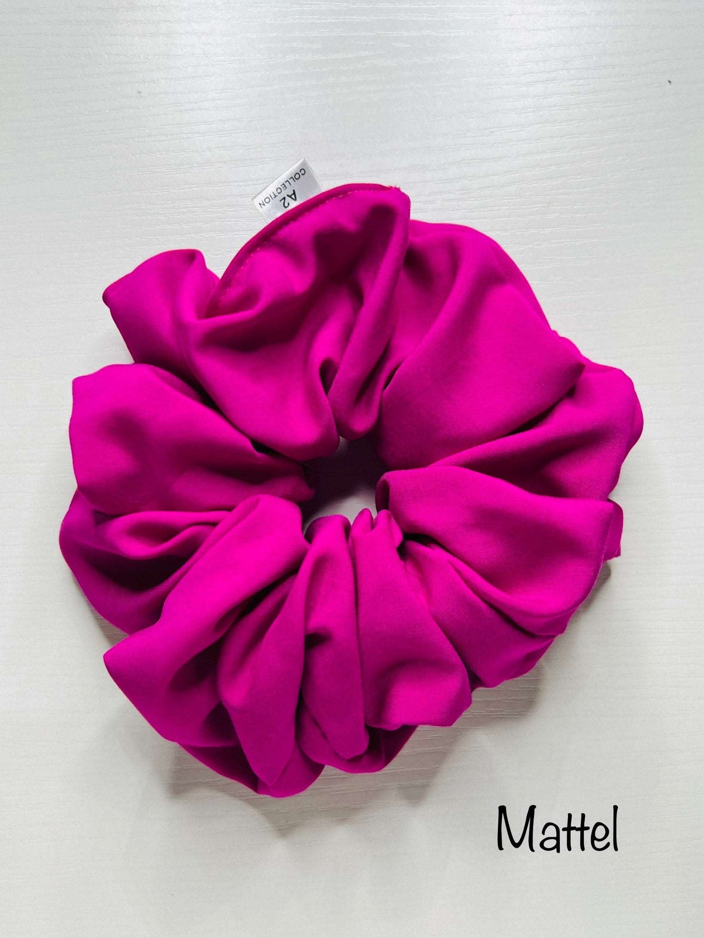 Elevate your hair game with our exclusive Barbie movie-inspired scrunchies, meticulously crafted from premium Pantone Viscose Poplin fabric